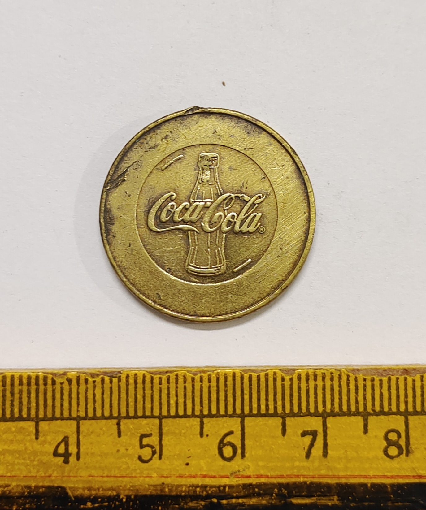 Rare vintage brass Token of Coca Cola , Value one Drink , small size .